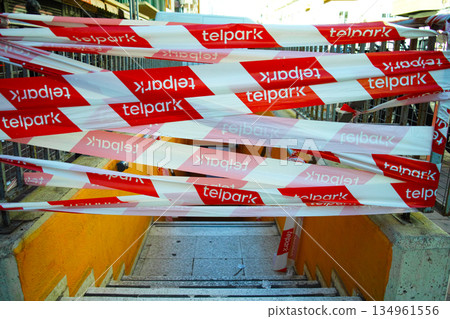 Entrance stairway blocked with red and white warning tape Entrance stairway blocked with red and white warning tape 134961556