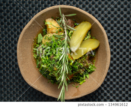 Rustic beef stew with rosemary garnish 134961612