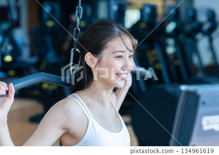 Young woman training in a sports gym 134961619