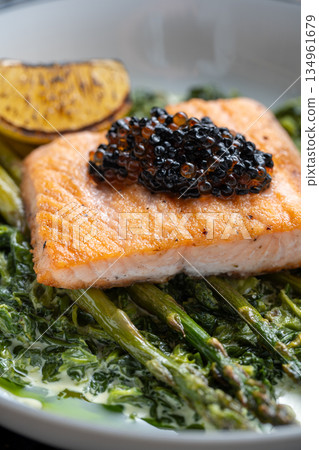 Grilled Salmon With Black Caviar Garnish Grilled Salmon With Black Caviar Garnish 134961679