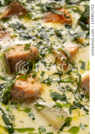 Creamy salmon soup with herbs Creamy salmon soup with herbs 134961702