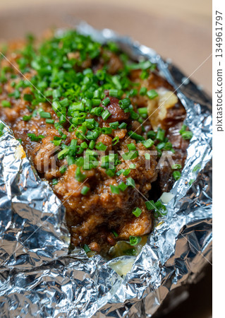 Baked Potato With Chives Topping Baked Potato With Chives Topping 134961797