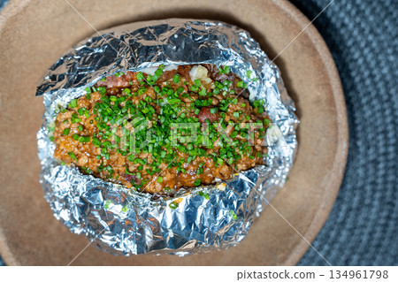 Baked Potato With Chili And Chives 134961798
