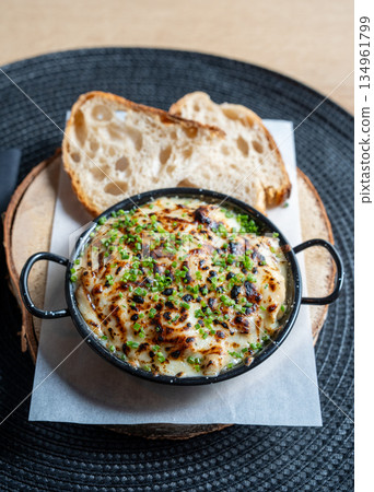Creamy Gratin Dish With Chives 134961799