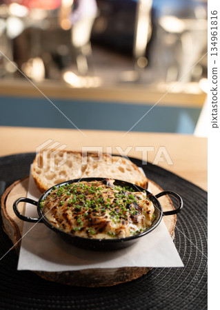 Baked Cheese Dish With Bread Slices Baked Cheese Dish With Bread Slices 134961816