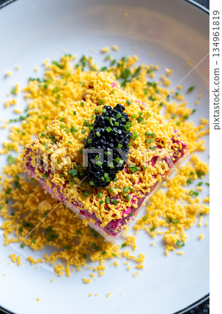 Gourmet salad with caviar and egg garnish Gourmet salad with caviar and egg garnish 134961819