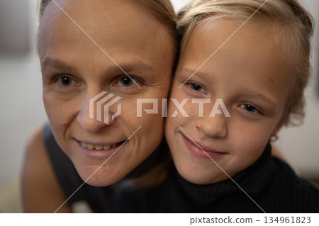 Mother and child smiling closeup 134961823