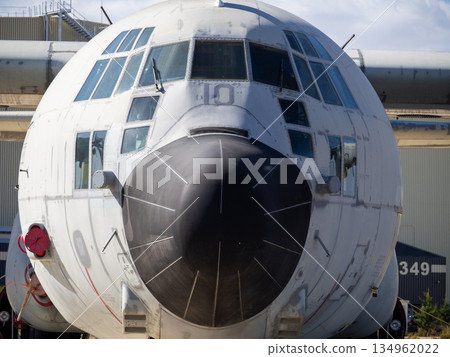 Nose section of old military transport aircraft on static display Nose section of old military transport aircraft on static display 134962022