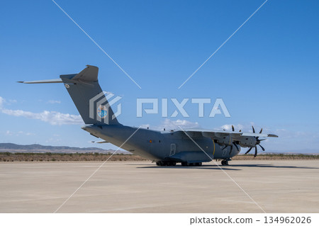 Military transport aircraft taxiing on runway Military transport aircraft taxiing on runway 134962026