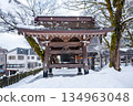 Snow-covered temple bell tower | A traditional Japanese landscape that captures the silence of winter 134963048