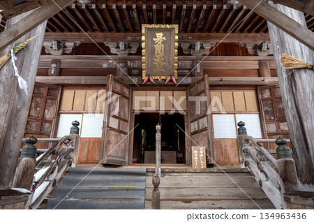The main hall and plaque of Urasa Bishamon-do in the snowy season The main hall and plaque of Urasa Bishamon-do in the snowy season 134963436