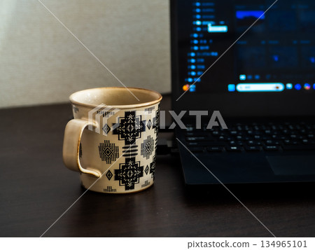 Laptop and freshly brewed coffee Laptop and freshly brewed coffee 134965101