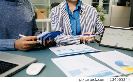 Business project team working together at meeting room at office.Horizontal. Business project team working together at meeting room at office.Horizontal. 134965244