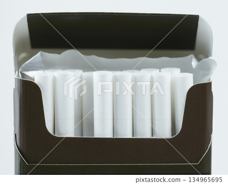 Open Cigarette Pack Showing White Filters Close-up. High quality photo Open Cigarette Pack Showing White Filters Close-up. High quality photo 134965695