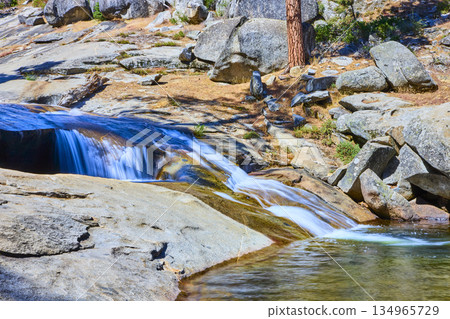 Marble Fork Kaweah River Flowing Over Granite Rocks in Sunlit Sequoia Forest Marble Fork Kaweah River Flowing Over Granite Rocks in Sunlit Sequoia Forest 134965729