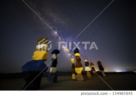 Seven Magic Mountains Colorful Rock Art Under Starry Sky and Milky Way in Nevada Seven Magic Mountains Colorful Rock Art Under Starry Sky and Milky Way in Nevada 134965845