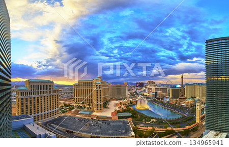 Las Vegas Strip Skyline Panorama with Hotels Fountains and Sunset Sky 134965941
