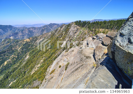 Moro Rock Granite Outcrop with Panoramic Sierra Nevada Mountains and Forest Moro Rock Granite Outcrop with Panoramic Sierra Nevada Mountains and Forest 134965963