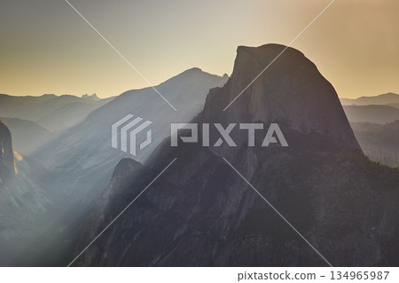Half Dome Sunrise View from Glacier Point with Sunbeam over Yosemite Valley Half Dome Sunrise View from Glacier Point with Sunbeam over Yosemite Valley 134965987