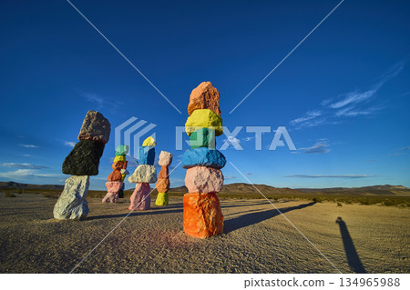 Seven Magic Mountains Colorful Rock Stack Installation in Nevada Desert under Blue Sky 134965988
