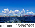 A view of the Tempozan Bridge, Osaka Aquarium Kaiyukan, and Minato Bridge from off the coast of Osaka Port at the mouth of the Aji River. Minato Ward, Osaka City 134967695