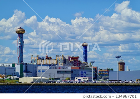 A view of the unique building of the Osaka City Construction Bureau's Maishima Sludge Center from off the coast of Osaka Port. Konohana Ward, Osaka City. 134967701