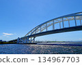 A view of Yumeshima across the white Yumemai Bridge in Konohana Ward, Osaka City 134967703