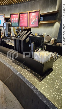 this is starbucks cafe display with food and drink 134968731