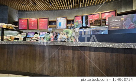 this is starbucks cafe display with food and drink 134968734