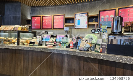 this is starbucks cafe display with food and drink 134968736