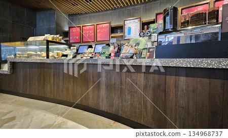 this is starbucks cafe display with food and drink 134968737