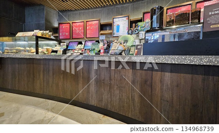 this is starbucks cafe display with food and drink 134968739