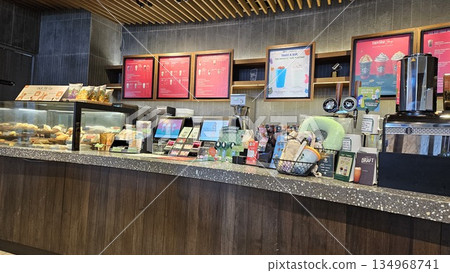this is starbucks cafe display with food and drink 134968741