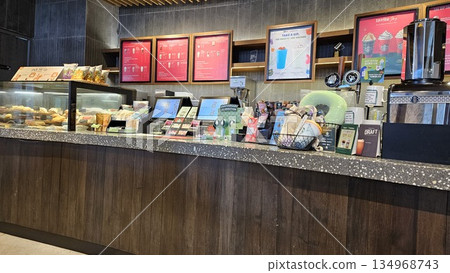 this is starbucks cafe display with food and drink 134968743