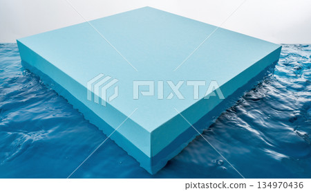 A light blue geometric pedestal floating on the water surface A light blue geometric pedestal floating on the water surface 134970436