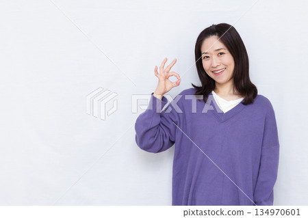 Woman signing OK Woman signing OK 134970601