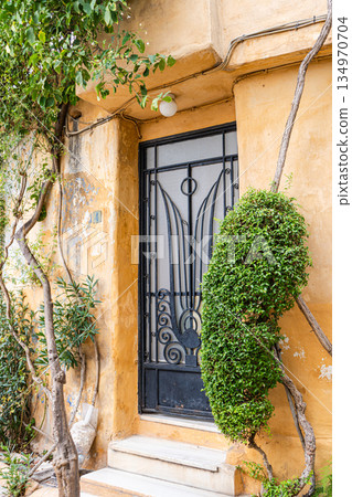 Narrow streets of Anafiotika area in ancient Athens Narrow streets of Anafiotika area in ancient Athens 134970704