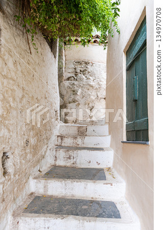Narrow streets of Anafiotika area in ancient Athens Narrow streets of Anafiotika area in ancient Athens 134970708
