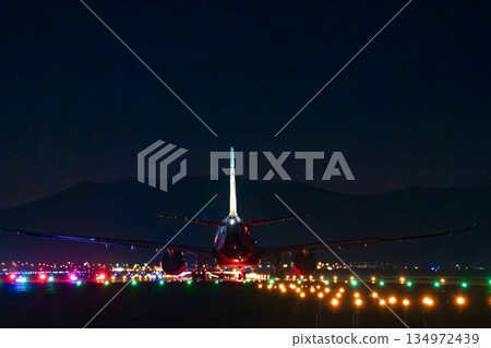 Sendai Airport at night, plane taking off, Natori City, Miyagi Prefecture Sendai Airport at night, plane taking off, Natori City, Miyagi Prefecture 134972439
