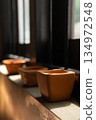 Row of Modern Square natural Clay Bowls 134972548