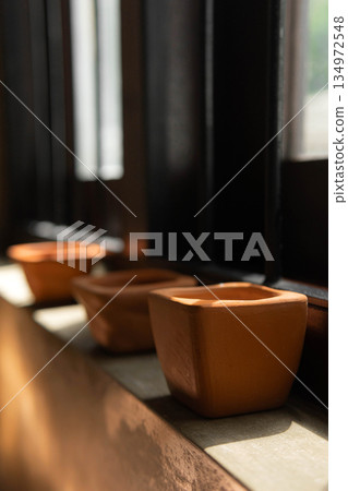 Row of Modern Square natural Clay Bowls Row of Modern Square natural Clay Bowls 134972548
