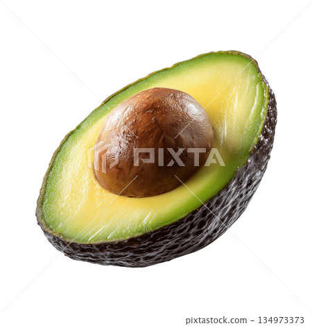 Freshly Sliced Avocado Displaying Creamy Texture and a Rich Brown Pit Inside 134973373