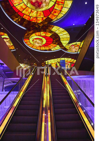 Escalator Stained Glass Ceiling and Chandelier Lights in Las Vegas Casino Escalator Stained Glass Ceiling and Chandelier Lights in Las Vegas Casino 134973649