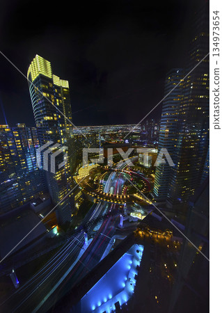 Nighttime Las Vegas Strip Skyscrapers and City Lights with Blue Pool View 134973654