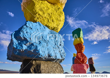 Colorful Rock Cairn Stacks at Seven Magic Mountains Under Blue Sky Nevada Colorful Rock Cairn Stacks at Seven Magic Mountains Under Blue Sky Nevada 134973678