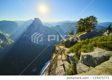 Half Dome Sunrise View from Glacier Point with Sunbeam and Granite Cliffs 134973771