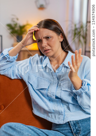 Woman at home suffers from unfair situation problem, break up, depressed, feeling bad, burnout 134974906