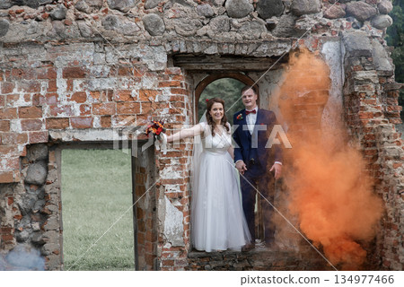 Smiling Wedding Couple With Smoke Accent Smiling Wedding Couple With Smoke Accent 134977466