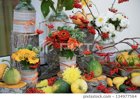 Autumn Floral Decoration With Pumpkins And Berries Autumn Floral Decoration With Pumpkins And Berries 134977564