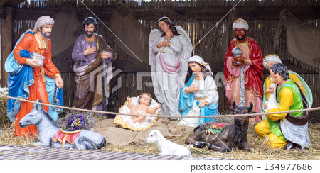Nativity scene with baby Jesus Mary Joseph angels and wise men in a festive stable display Nativity scene with baby Jesus Mary Joseph angels and wise men in a festive stable display 134977686